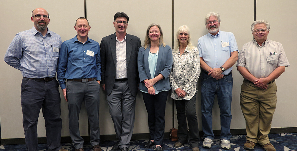 RMCAVS Board Members from left to right: Andrew Cavanagh, Steve Harvey, Cristian Ciobanu, Lorelle Mansfield, Rosine Ribelin, Tim Gessert, and Neil Peacock